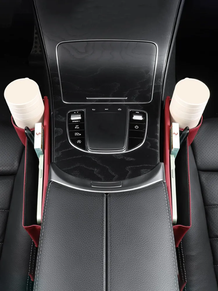 Organiser fitted between the seat and the centre console